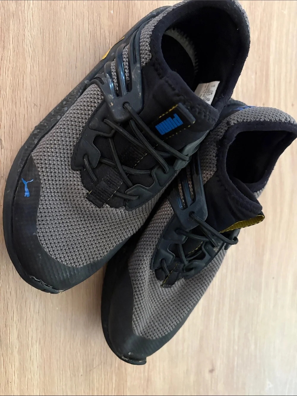 Puma Grey and Black Trainers with Blue Logo